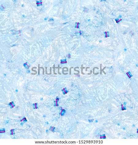 Blue crumpled bottle seamless background. Garbage backdrop- concept of plastic- recycle, saving the environment and pollution of the world ocean