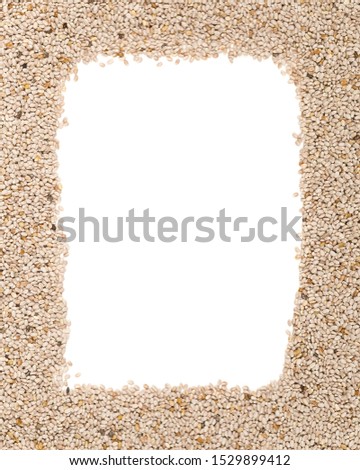 Whole, organic white chia seeds texture frame background top view from above with copy space