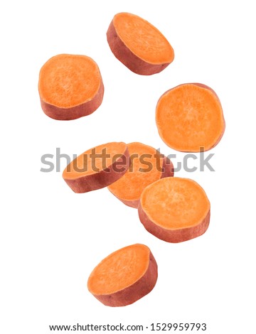 Falling sweet potato, slice, isolated on white background, clipping path, full depth of field Royalty-Free Stock Photo #1529959793