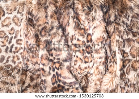 Trendy animal printed pattern of panther long fur textured background
