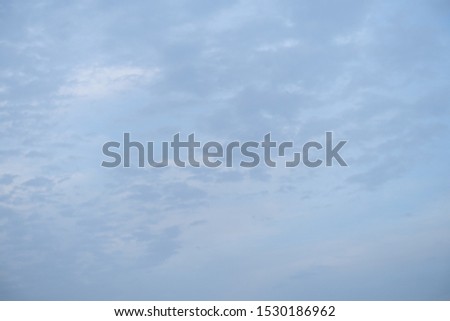 Sunny day with blue sky and clouds