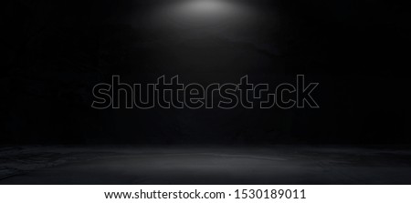 Black, dark and gray abstract cement wall and studio room , interior texture for display products. wall background. Royalty-Free Stock Photo #1530189011