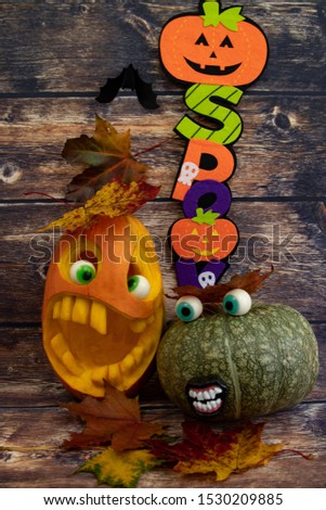 Halloween is a fun holiday that drives away evil from the house. A family of pumpkins, mom, dad and son. Funny home decor.