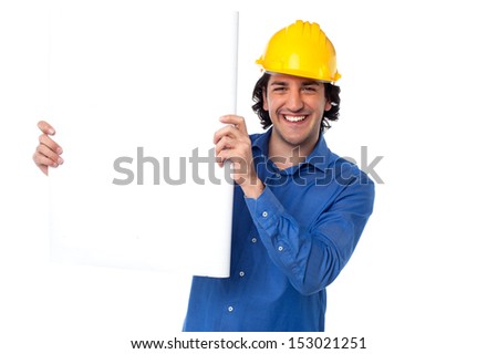Young civil engineer holding blank whiteboard