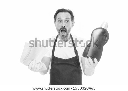 Cleaning tricks and tips. Cleaning service and household duty. Man in rubber gloves hold bottle liquid soap chemical cleaning agent. Bearded guy cleaning home. Cleanup concept. Get rid of stains.