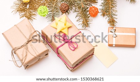 Winter time and christmas holidays concept. How get ready for christmas. Christmas decorations wooden background top view. Tips for preparing christmas in advance. Present box and gift tag copy space.