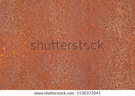 Close-up of metal surface of rubiginous color Royalty-Free Stock Photo #1530372041