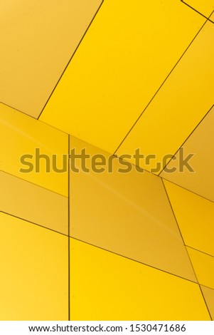 Yellow Decorative Cladding Panels for facade and exterior cladding. Abstract Architecture Background. High Resolution Photography.