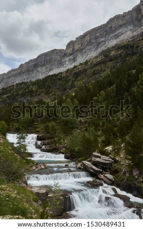 The waterfalls of the Gradas de Soaso of the Arazas river in the National Park of Ordesa and Monte Perdido in the Pyrenees of Huesca. Aragon. Spain