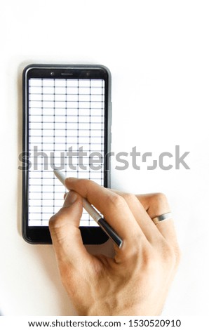 Electronic signature by a male hand on a smartphone with a black frame on a white background close-up, top, side view. Secure Signature. Signature in e-ID. Electronic documents