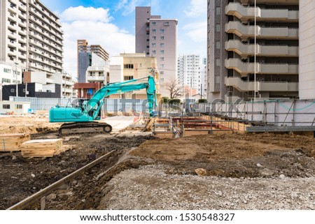 Building construction site in the city Royalty-Free Stock Photo #1530548327
