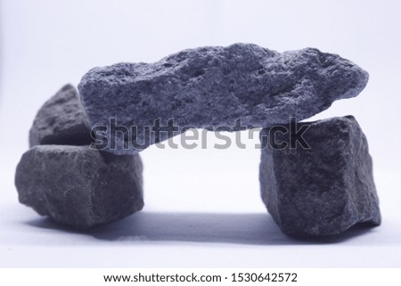 black stone on a white background