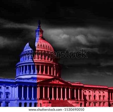 The United States capitol building half red and blue, representing Democrat and Republican political division  Royalty-Free Stock Photo #1530690050