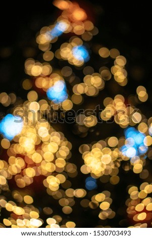 Beautiful Christmas background with garlands and bokeh. New year  multi-colored picture. Abstract photo image for design