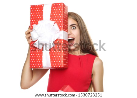 Beautiful woman holding gift box on white background
