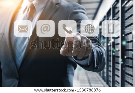 Businessman pressing illustrating phone button