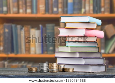 School learning concept with coins on library background