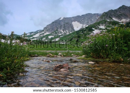 Scenic of mountain lake near Fisht Mount, Adygea, Russia