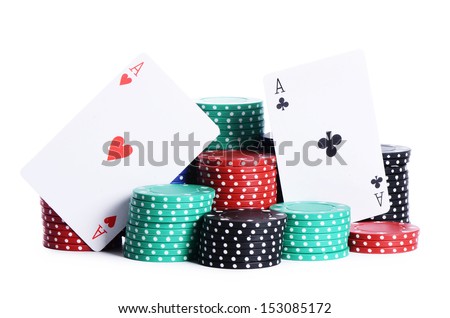 Ases and casino chips isolated on white