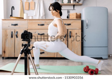 Blogger shoots a video of her workout
