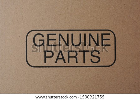 genuine parts text on the brown cardboard. 