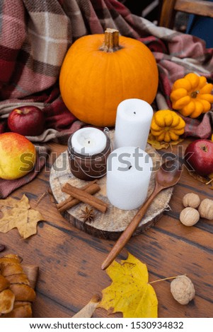 Thanksgiving Day. Orange pumpkins, autumn leaves. Gifts of nature. Happy Thanksgiving. Be thankful. Gather with family. Harvest. Post card. Free space for text.