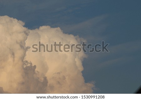 white cumulus clouds and beautiful blue sky and abstract background. Cloudscape background. Blue sky and fluffy white clouds on sunny day. Nature weather. Bright sky and puffy clouds for happy day.
