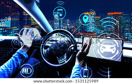 Person using a car in autopilot mode hands free