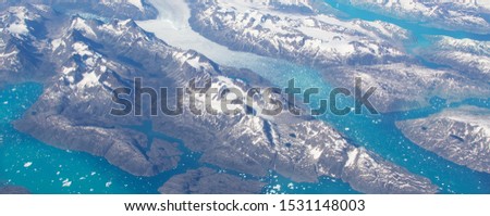 Aerial view of scenic Greenland Glaciers and icebergs Royalty-Free Stock Photo #1531148003