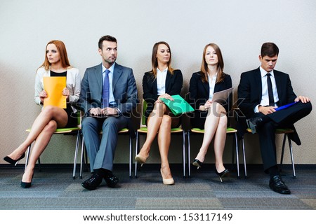 Business people waiting for job interview Royalty-Free Stock Photo #153117149