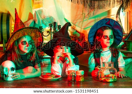 Happy kids on Halloween party. Group kids like zombie or witch Ready for Trick or Treat. Calaverita. Trick-or-treating