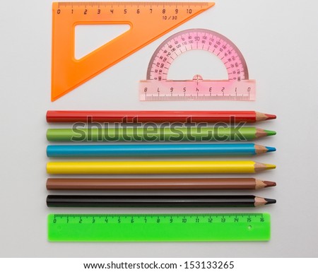 protractor ruler pencils on a white background necessary accessories of the pupil