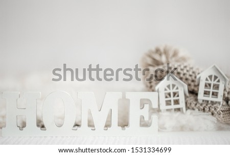 Back light background with Wooden inscription home. The concept of house and home .