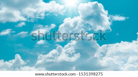 Blue sky and white clouds with sun background, cloudy sky

