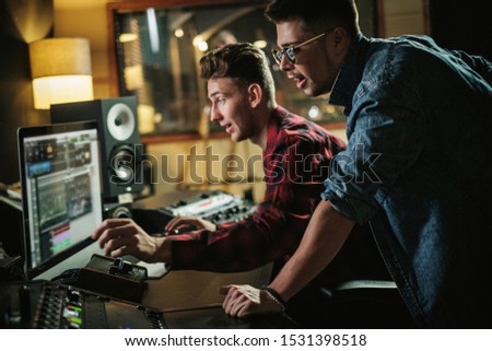 Sound engineer working in a music studio