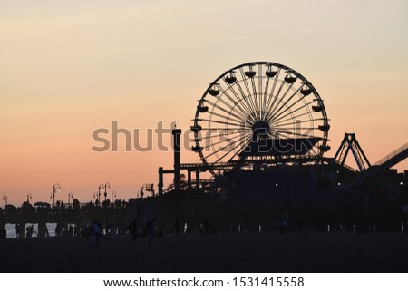 Sunset at Santa Monica Pier Royalty-Free Stock Photo #1531415558