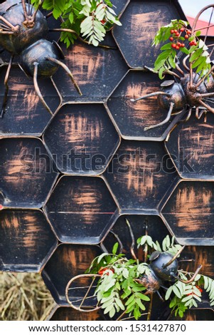 Decorative wall like a honeycomb. Agricultural Exhibition.