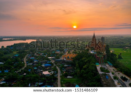 Beautiful sunrise in the morning at Wat Tham Sua in Kanchanaburi province, Thailand. Wat Tham Sua is one of famous temples in Kanchanaburi.