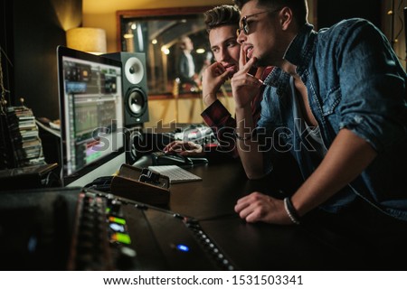 Sound engineer working in a music studio