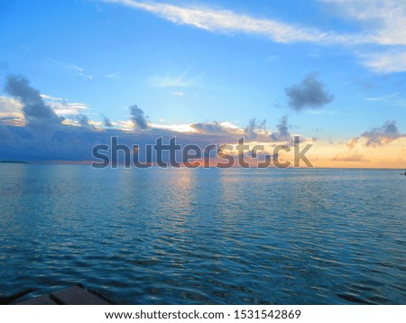 sunset on a beautiful tropical island of tahiti