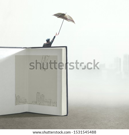 man with umbrella flying out of a illustrated book; surreal concept