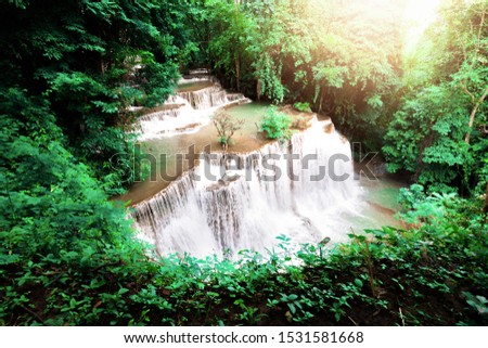 Blurred photo of Huai Mae Khamin Waterfall at Kanchanaburi in Thailand