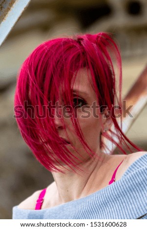 Portrait of beautiful red-haired girl