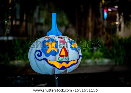 Fancy pumpkin doll in various colors to decorate in various places during the Halloween season