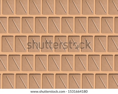 Notebook diary pencil pattern on beige background