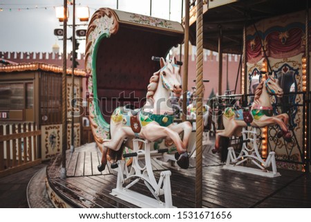 Children's carousel at the New Year's fair in Moscow, winter