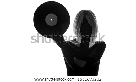 Portrait of a beautiful woman with vinyl