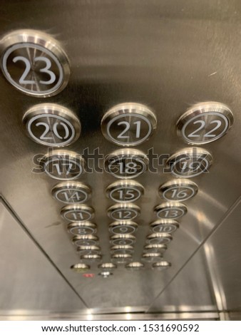 Elevator buttons metal background. Elevator cabin in the house