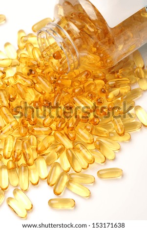 Vitamin Omega-3 fish oil capsules on white background