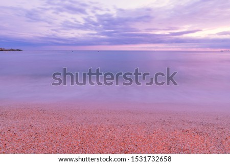 Beach, sky and  sea for background. Image contain soft focus and blur due to long expose.